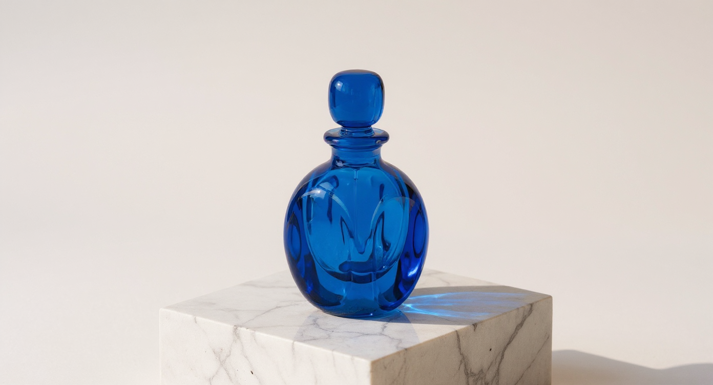 FLUX Kontext Max: blue glass perfume bottle